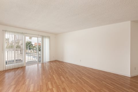 Living Room with Hardwood Floors and Patio Doors